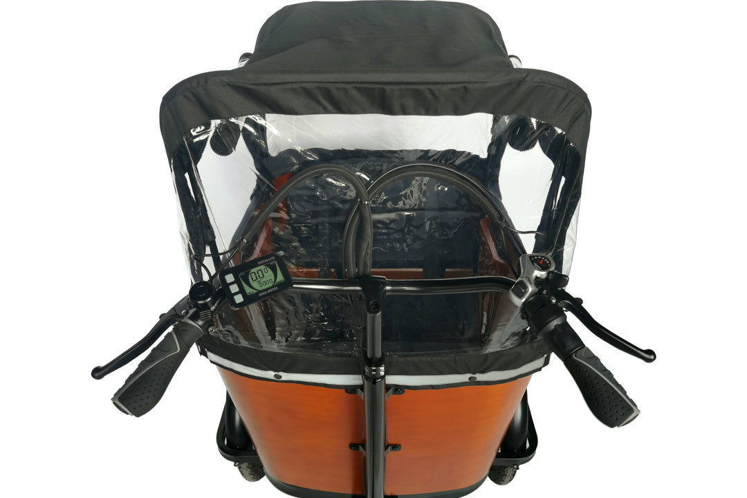 What makes front cargo tricycles more stable?