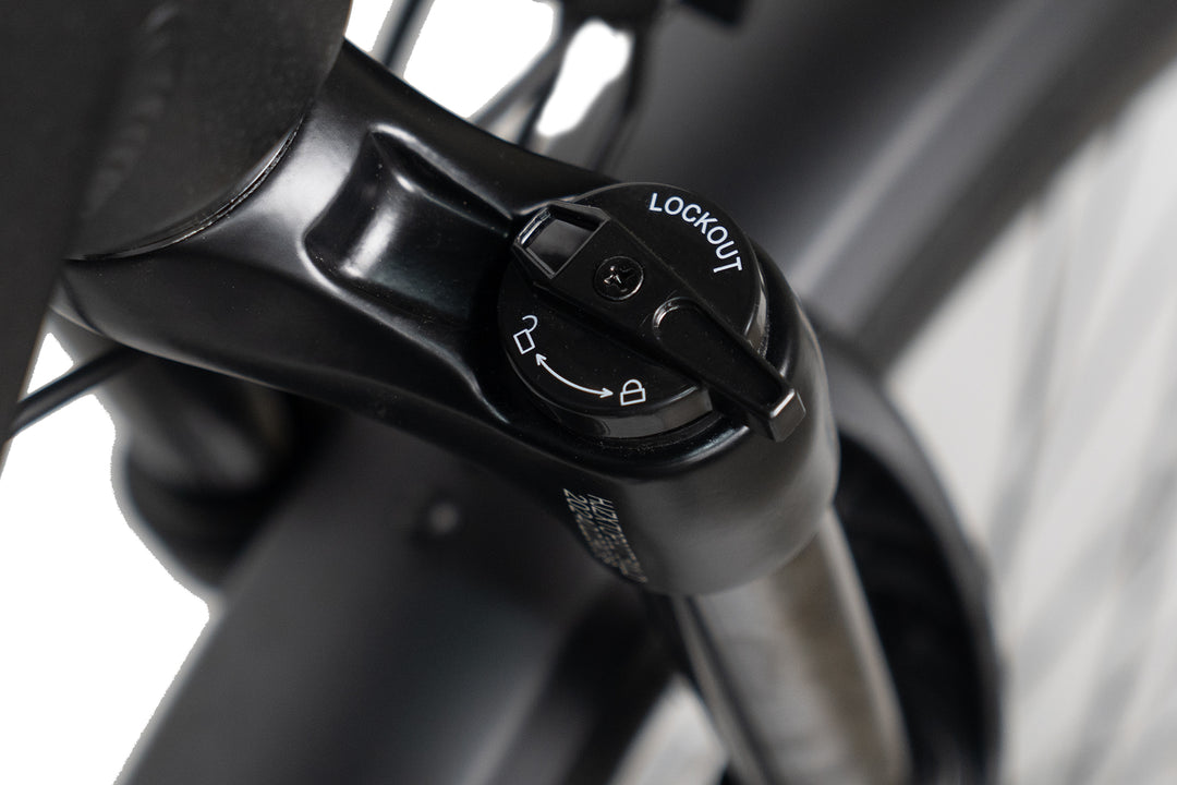 How does pedal assist reduce rider fatigue on cargo bikes?